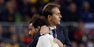 Real Madrid's Brazilian defender Marcelo (L) is hugged by Real Madrid's Spanish coach Julen Lopetegui as he leaves the pitch during the Spanish league football match between FC Barcelona and Real Madrid CF at the Camp Nou stadium in Barcelona on October 28, 2018. (Photo by Josep LAGO / AFP) (Photo credit should read JOSEP LAGO/AFP/Getty Images)